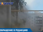 На улице Горького дорожники подняли пылевые облака до уровня пятиэтажки