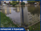 Огромная парковка на Курчатова превратилась в болото