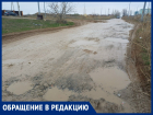 «Сфотографировали другой участок и отказали в ремонте»: жители проспекта Лазоревый требуют восстановить разбитую подрядчиком дорогу