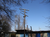 13. Сохранившийся деревянный столб с ликвидированной железнодорожной телеграфной линии Куберле - Морозовская, 2015 год