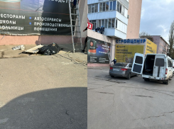 В старом городе женщина упала с высоты на крышу магазина 