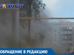 На улице Горького дорожники подняли пылевые облака до уровня пятиэтажки