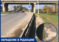 Оголенный провод на земле у моста смутил волгодончанку