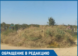 Горы мусора уже закрывают могилы, - волгодончанка