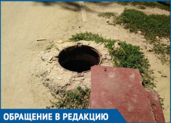 Волгодонцы вынуждены закрывать опасный люк кусками старой тумбы 